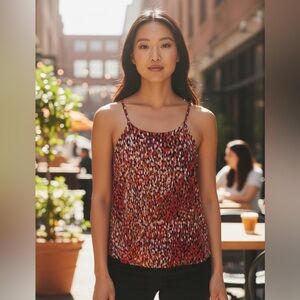 Halter tank great for under a suit jacket. Size L polyester & spandex